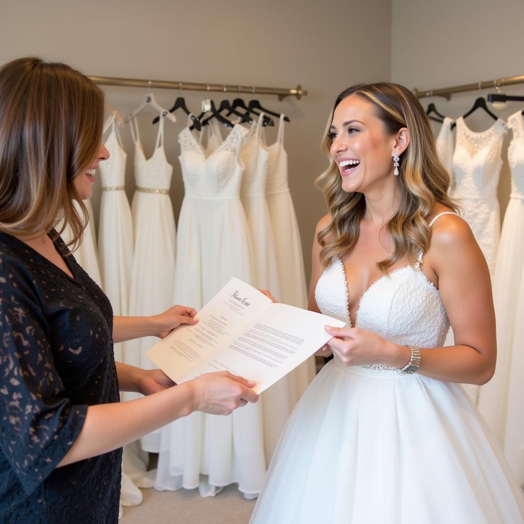 Bride-to-be consults with a stylist at Belle Vogue Bridal in Lenexa