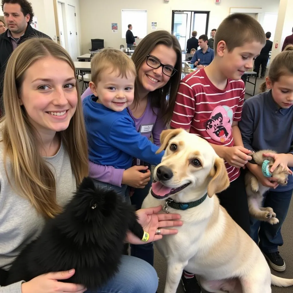 Cedar Bend Humane Society Adoption Event: A heartwarming scene of families meeting adorable animals