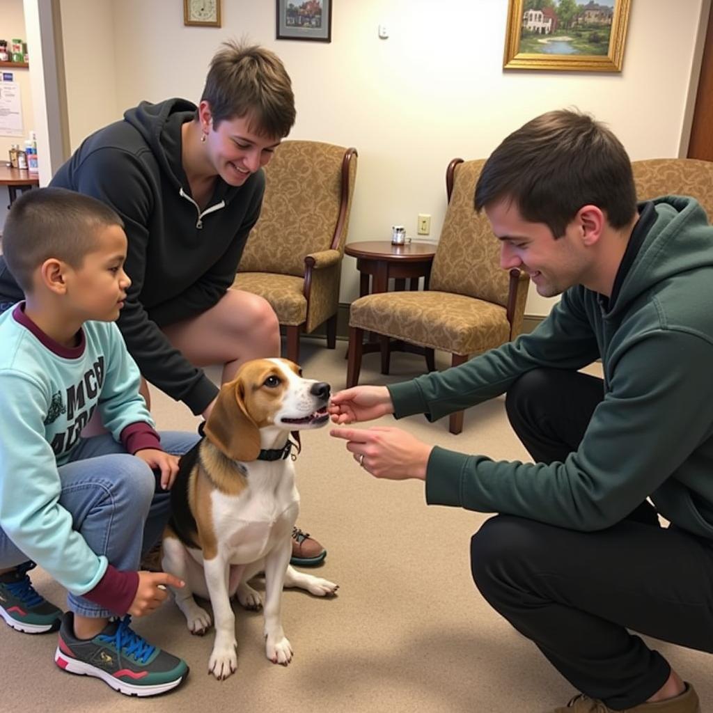 A family enjoys a meet-and-greet with a potential furry family member at the Effingham County Humane Society