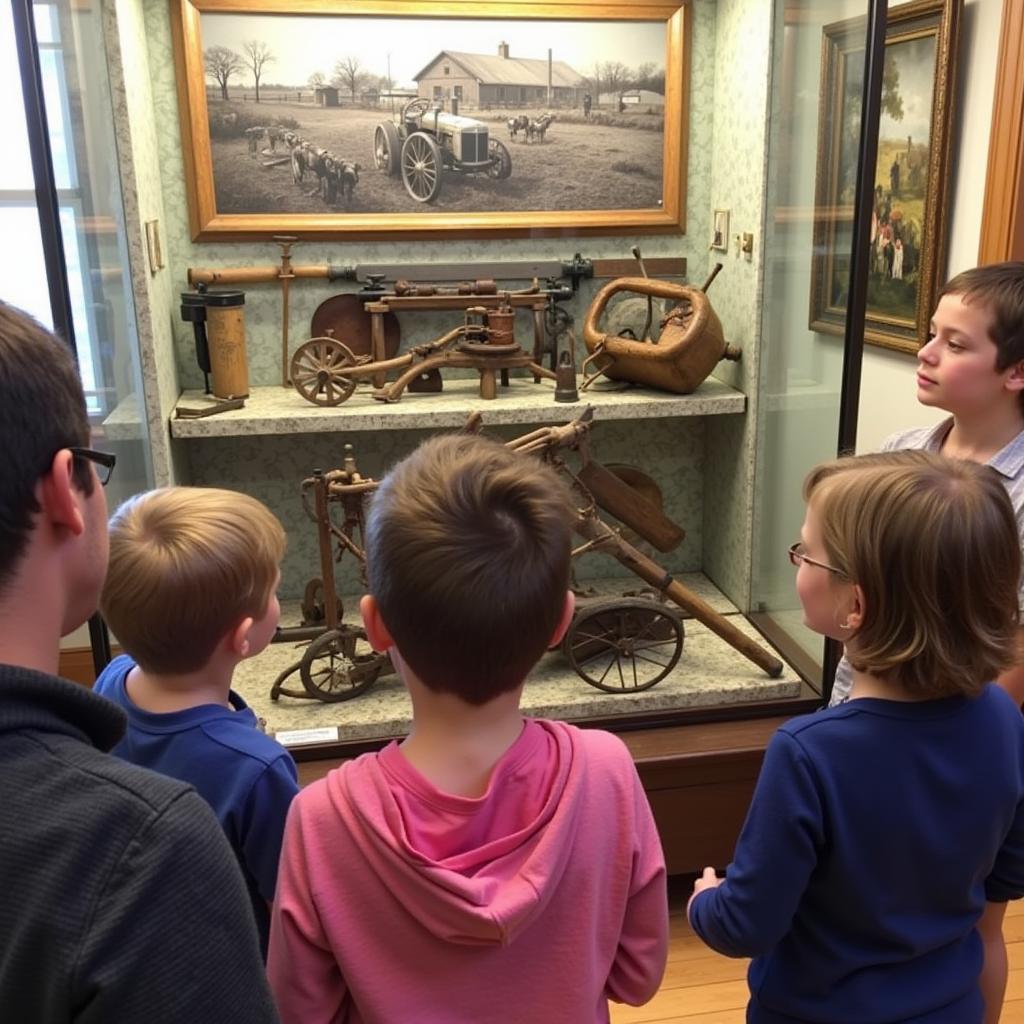 Visitors exploring an exhibit at the Elizabethtown Historical Society