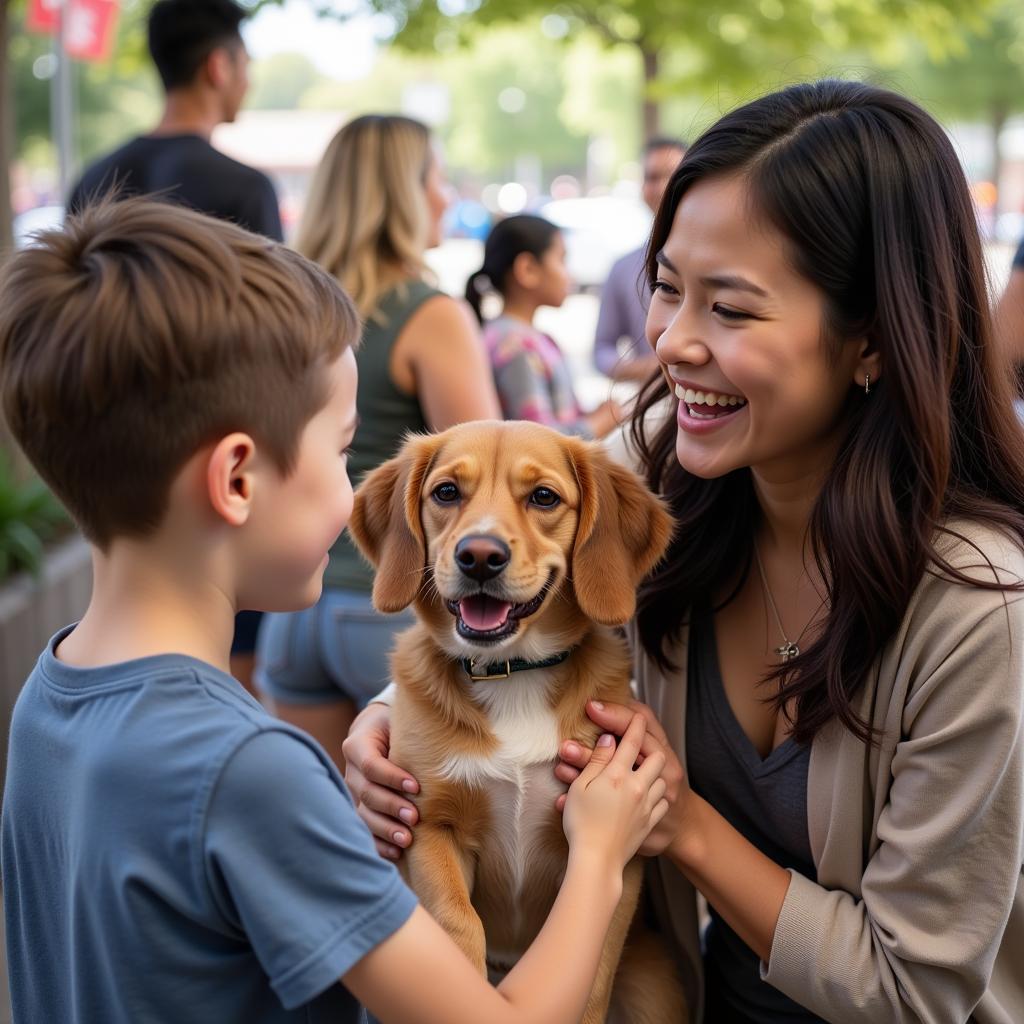  A family adopting a dog at a Fernandina Humane Society event 