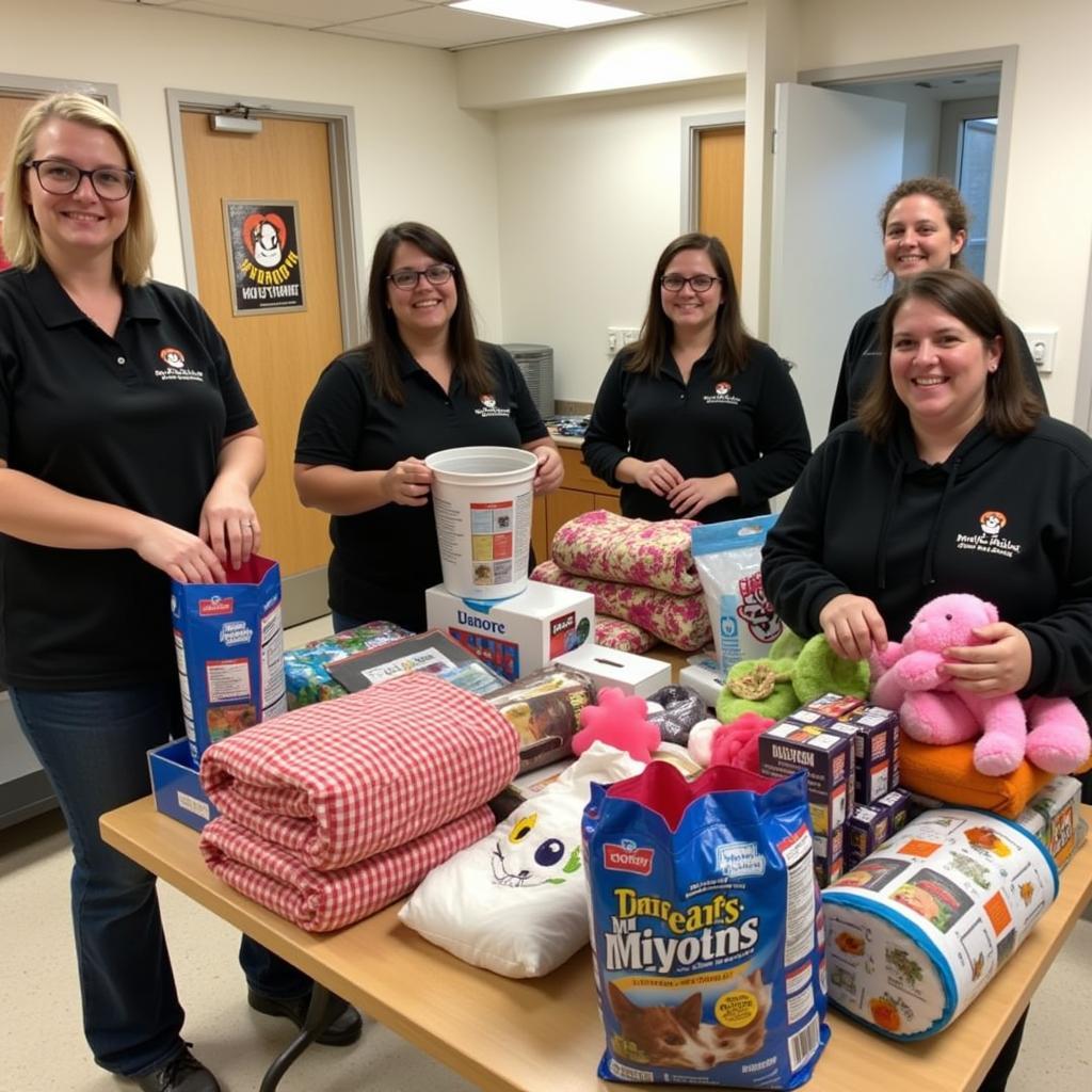 Volunteers sorting through donated items at the Humane Society