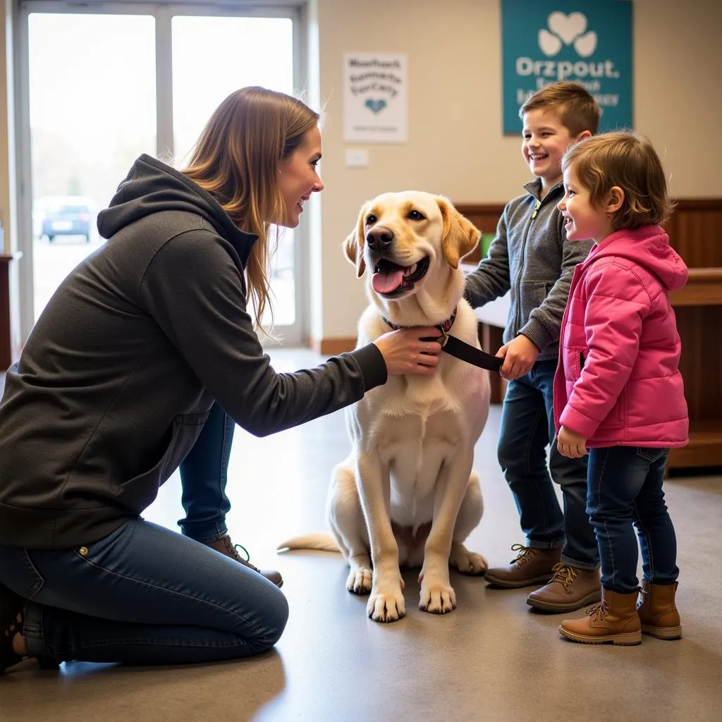 Family Meeting a Dog at Moorhead Humane Society