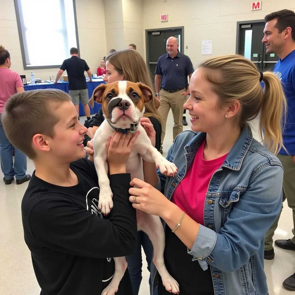 A family finds their perfect match at an Opelika Humane Society adoption event