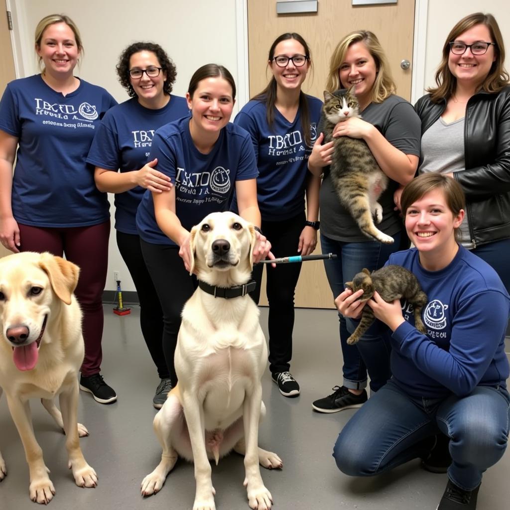 Volunteers spending time with animals at the Park Rapids Humane Society