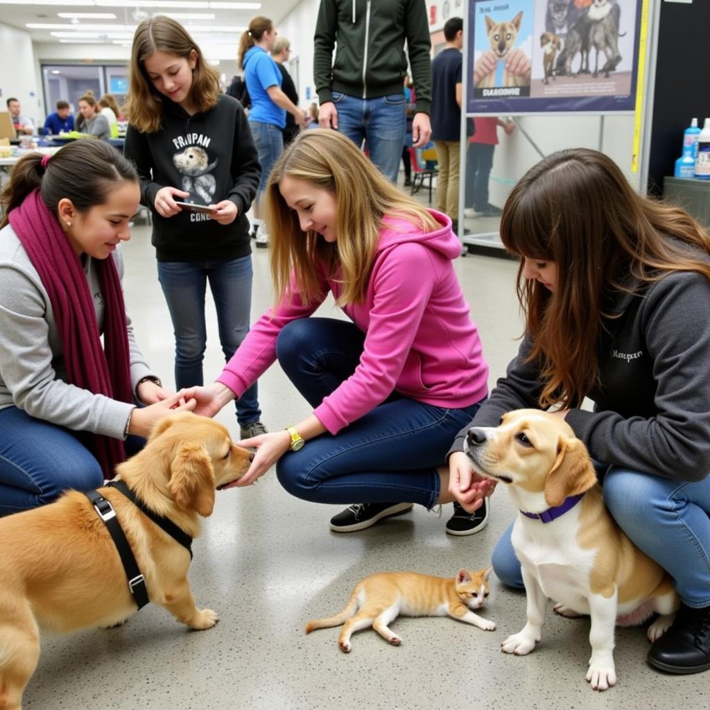 A joyous scene at a PSPCA adoption event, featuring families meeting adoptable dogs and cats.