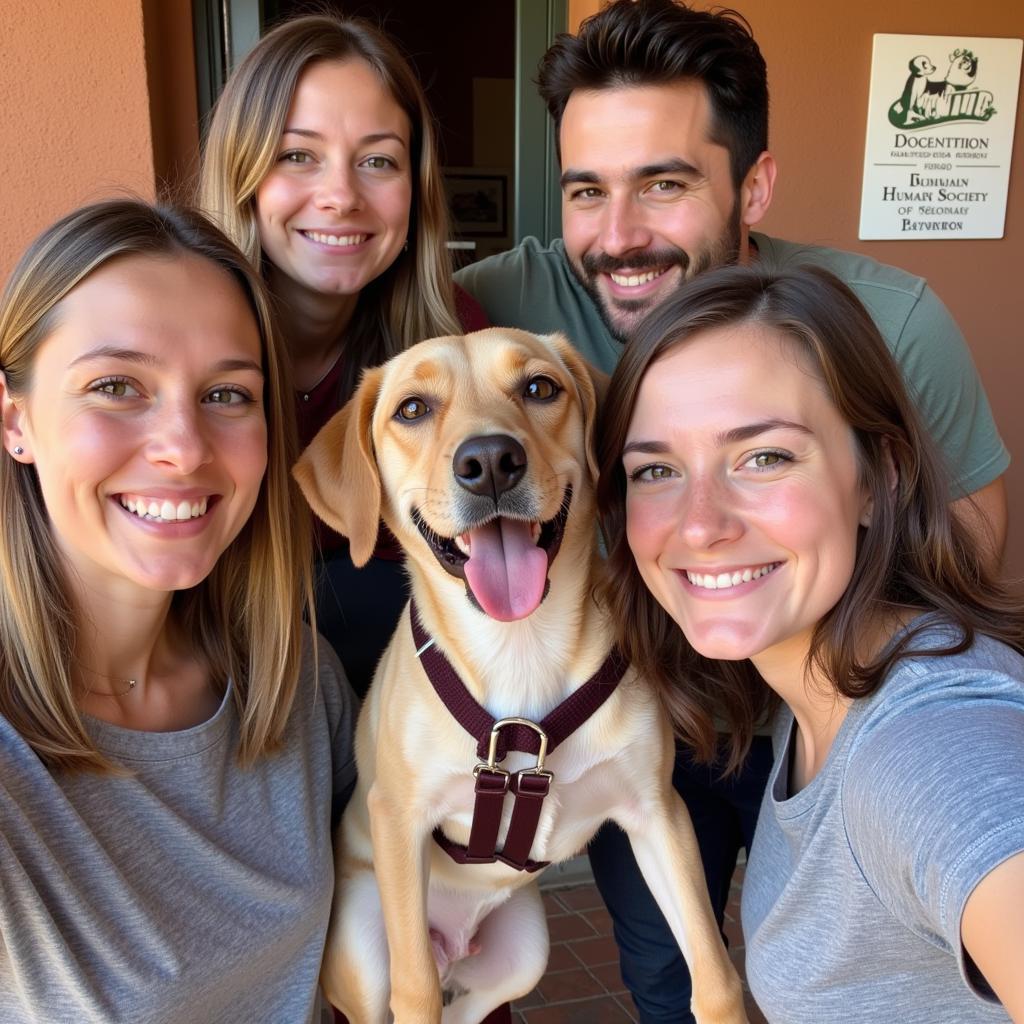  A happy family with their newly adopted dog from the Humane Society of Sedona