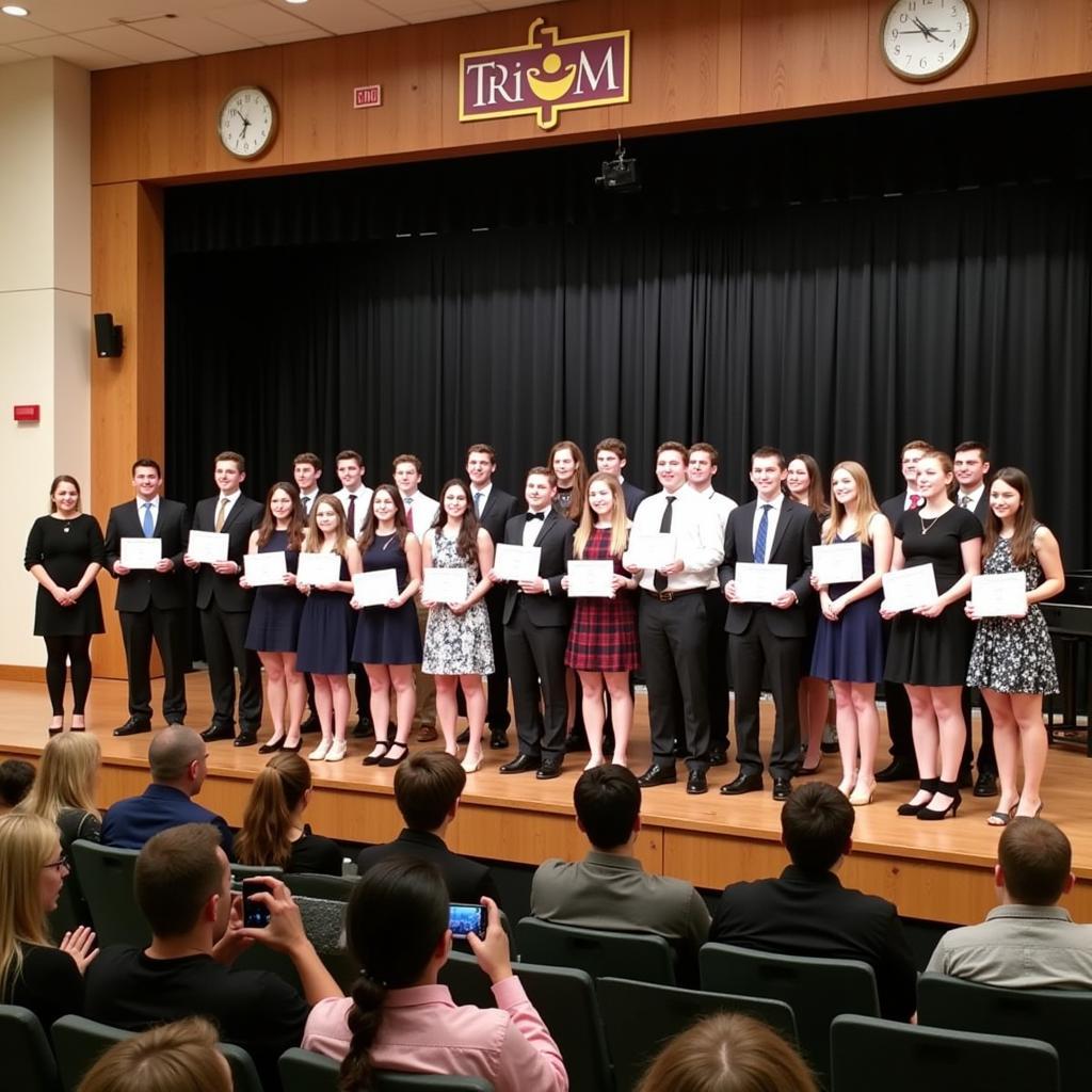 Students being inducted into Tri-M