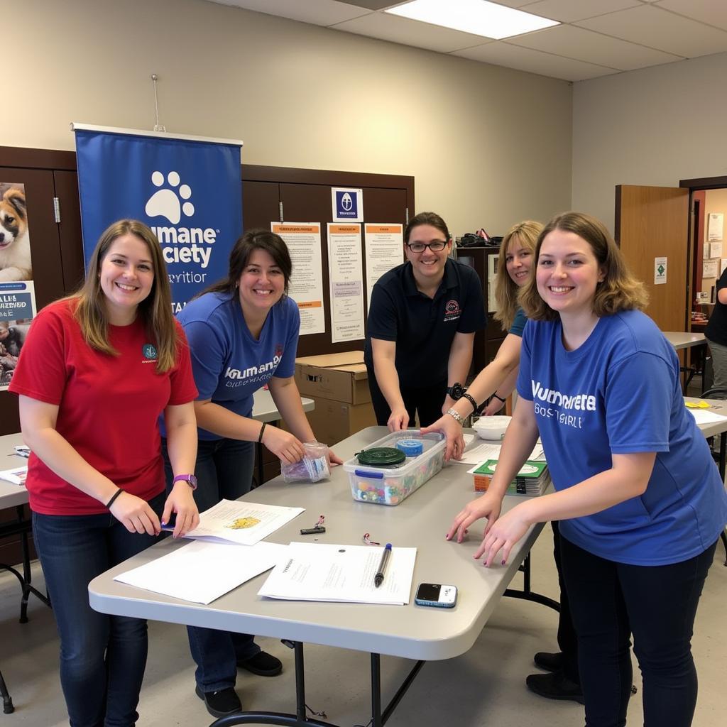 Volunteers setting up for a humane society event