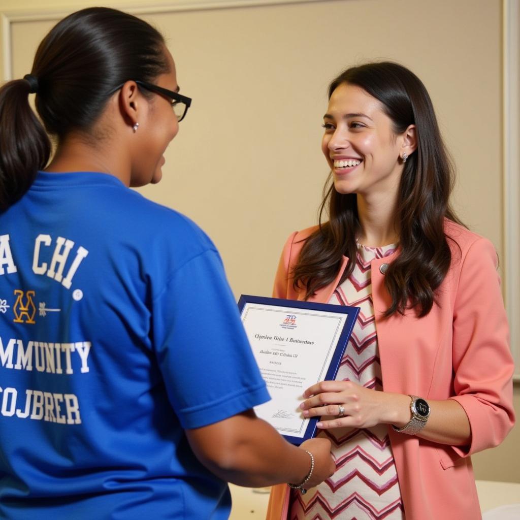 Alpha Chi Student Receiving an Award for Outstanding Service