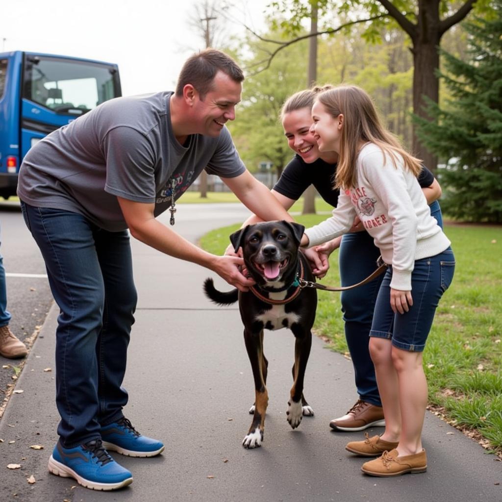 Family adopting a dog at the Elwood Humane Society