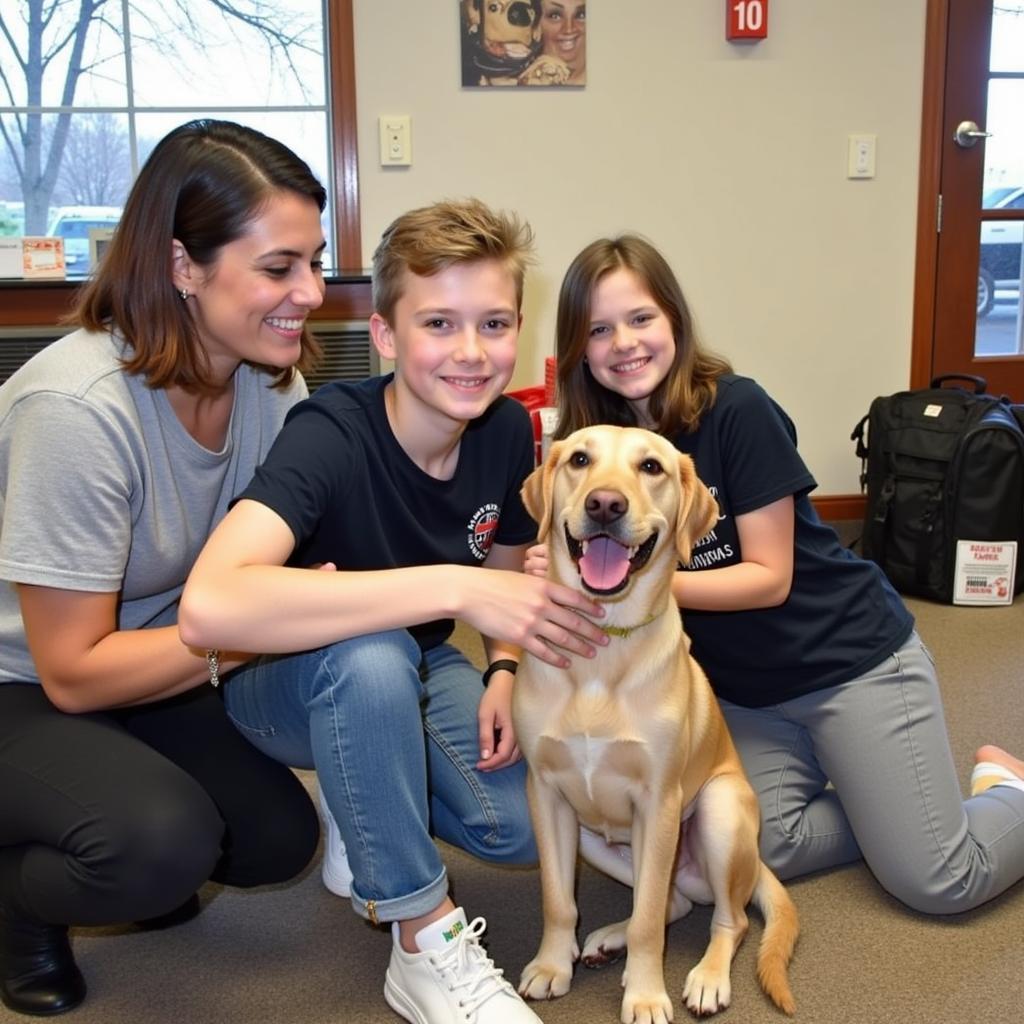 Happy family adopting a pet at the Kenosha Humane Society