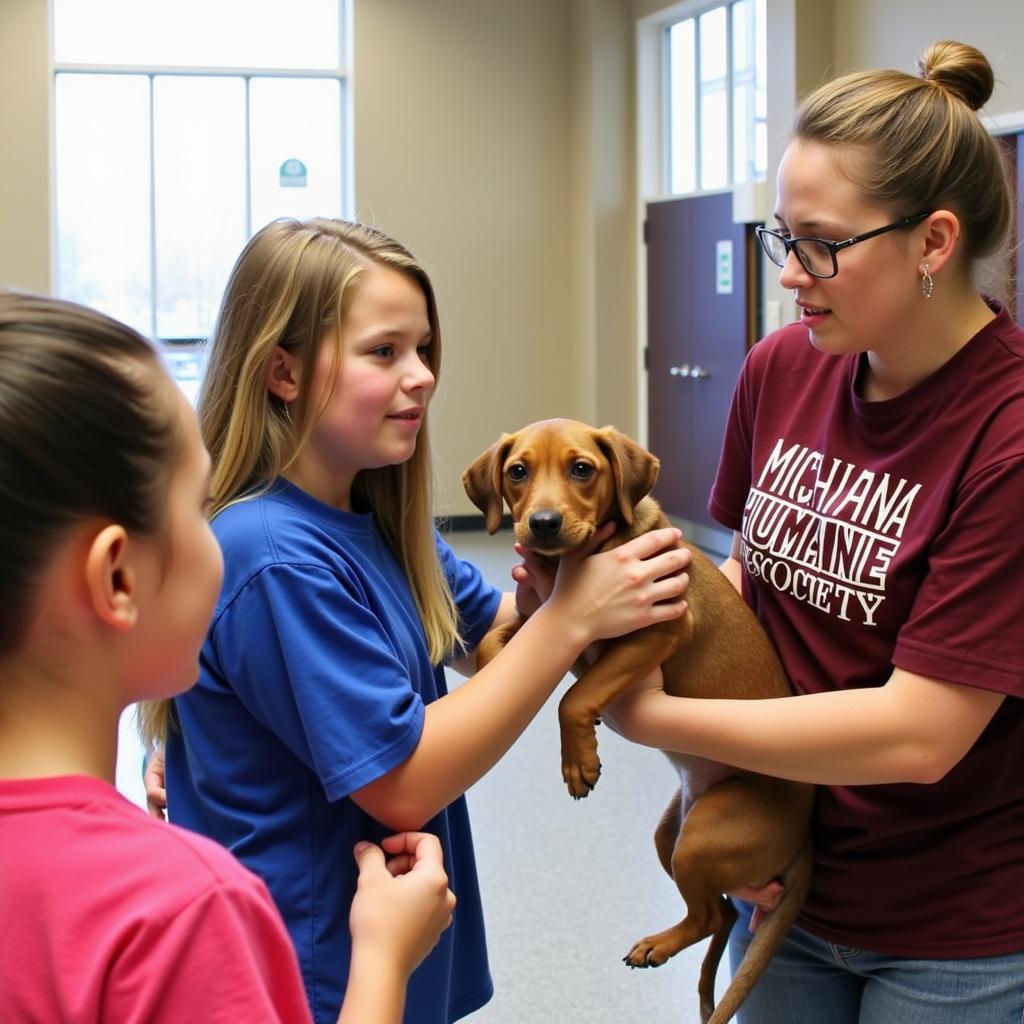 Michiana Humane Society Community Outreach: A staff member educating children about pet care.