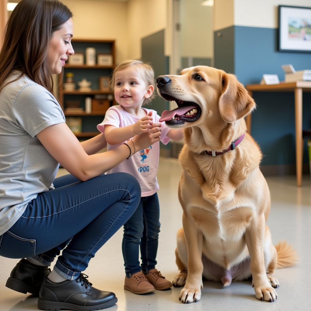 Adoption Counselor at Minneapolis Humane Society Helping a Family Choose a Pet