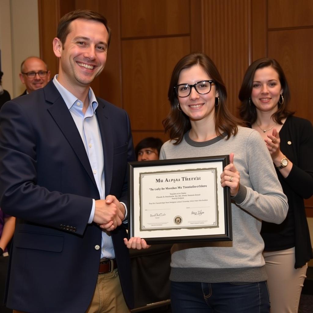 Mu Alpha Theta Member Receiving a Math Award