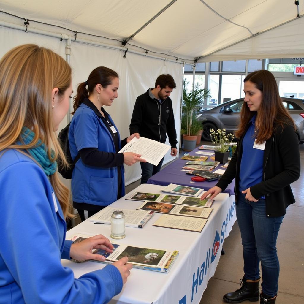 Erie County Humane Society staff members educating the community about responsible pet ownership.