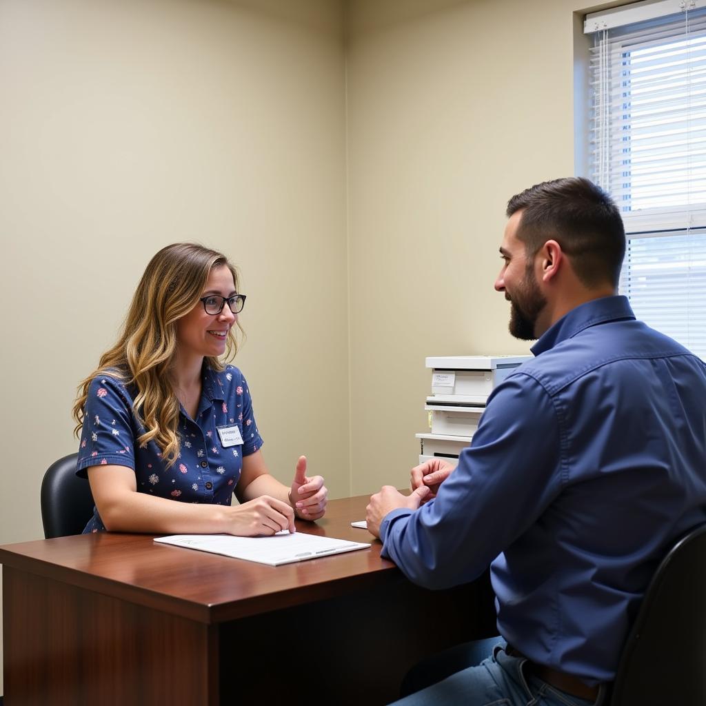 Patient receiving a consultation with a chiropractor